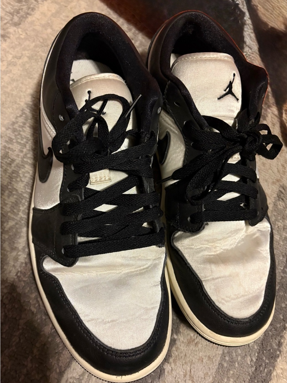 Nike Air Jordan Satin Black and White Low-Top Sneakers